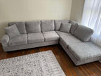 Grey corduroy reversible sectional with drop down cup holders and optional storage ottoman