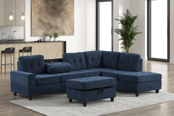 Blue performance fabric reversible tufted sectional with drop down cup holders and storage ottoman