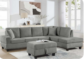 Grey corduroy reversible sectional with drop down cup holders and optional storage ottoman