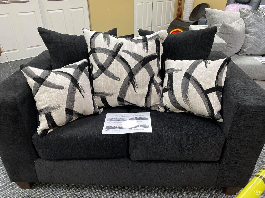 Black sofa and love seat with decorative pillows- new