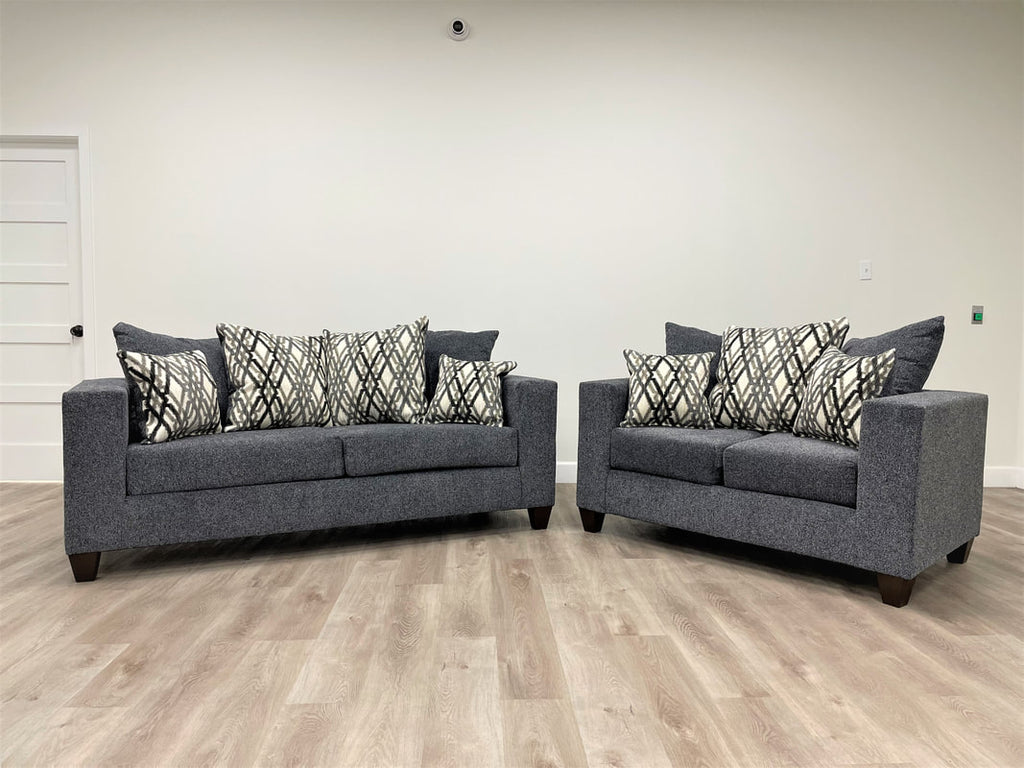 Steel grey sofa and love seat with decorative pillows- new
