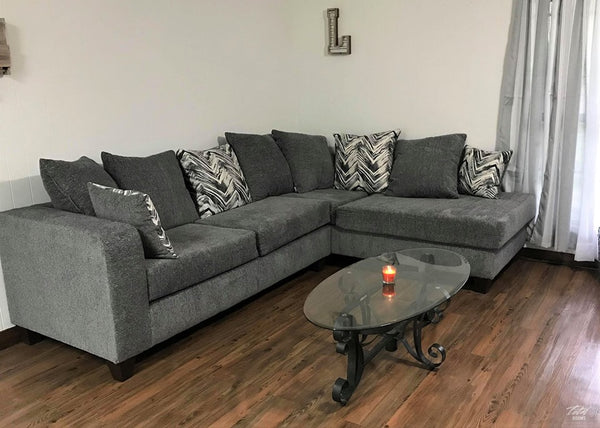 Charcoal Sectional includes throw pillows