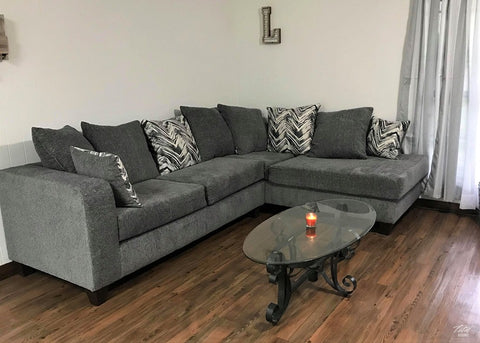 Charcoal Sectional includes throw pillows