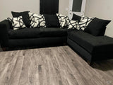 Black Sectional includes throw pillows