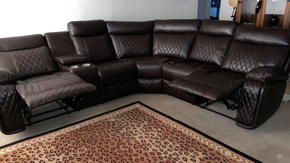 Soft brown leather reclining sectional with cup holders