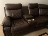 Soft brown leather reclining sectional with cup holders