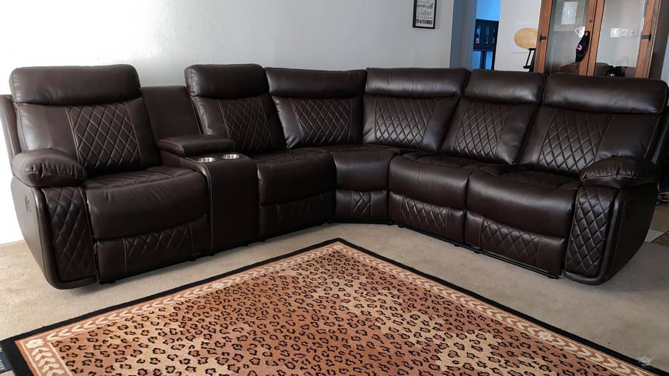 Soft brown leather reclining sectional with cup holders