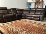 Soft brown leather reclining sectional with cup holders