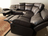 Soft brown leather reclining sectional with cup holders