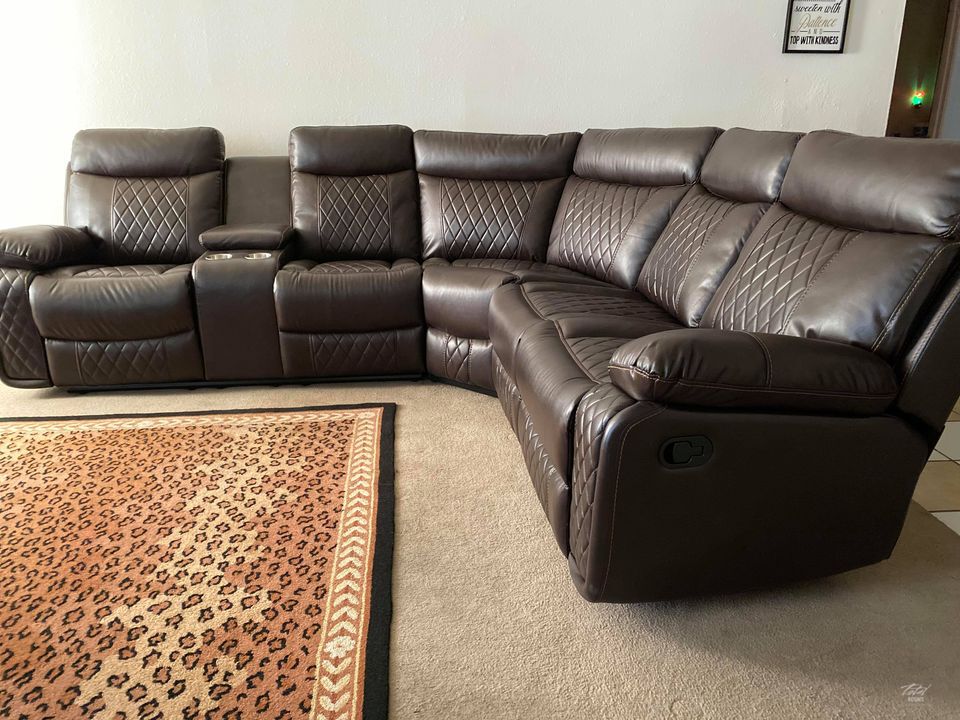 Soft brown leather reclining sectional with cup holders
