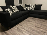 Black Sectional includes throw pillows