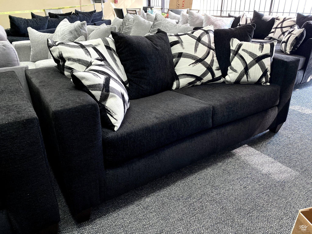 Black sofa and love seat with decorative pillows- new
