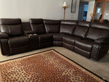 Soft brown leather reclining sectional with cup holders