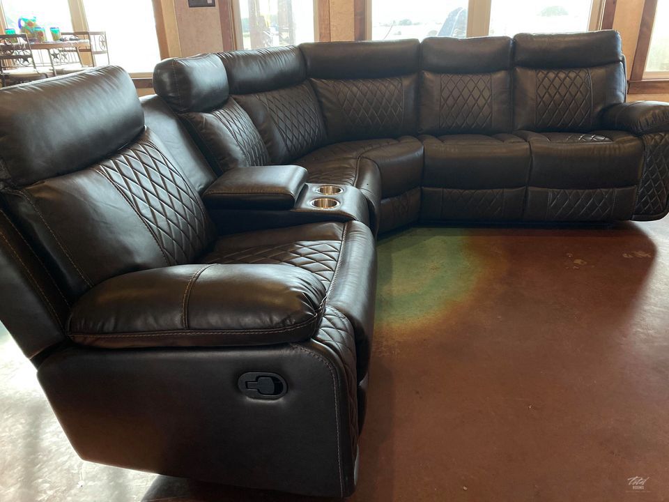 Soft brown leather reclining sectional with cup holders