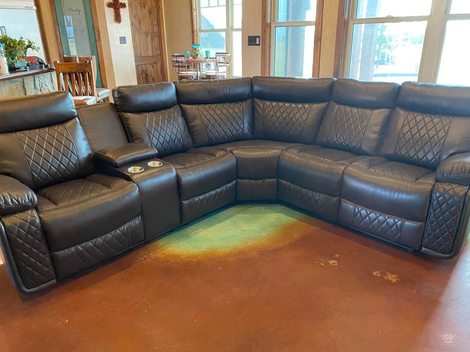 Soft brown leather reclining sectional with cup holders
