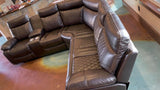 Soft brown leather reclining sectional with cup holders