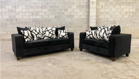Black sofa and love seat with decorative pillows- new