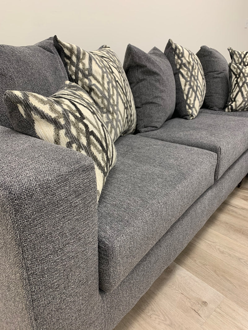 Steel Grey Sectional includes throw pillows